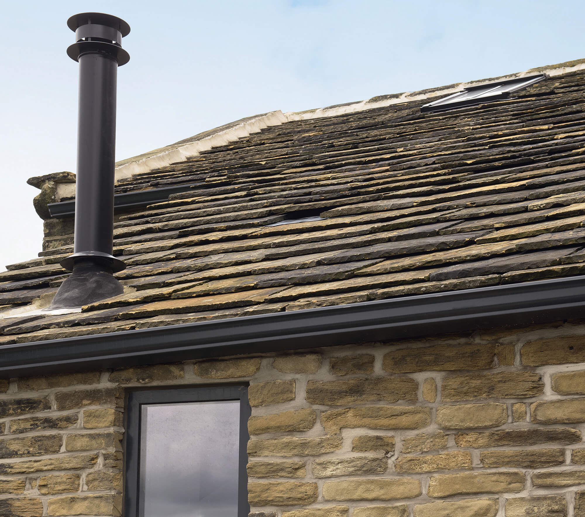 Barn roof tiles with access for bats