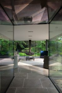 Ultra-modern glass extension to a listed home