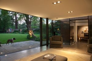 Ultra-modern glass extension to a listed home