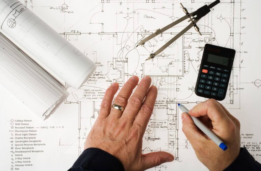 Architect drawing house plans