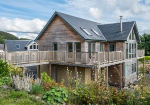 Fleming Homes self-build accessed by bridge