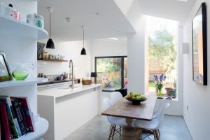 Kitchen scheme with vaulted ceiling by Architecture for London