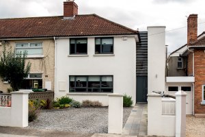 End of terrace home with modernist timber frame extension