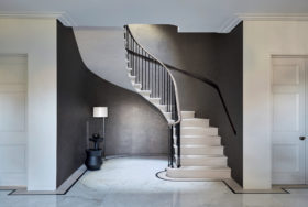 Curved cantilevered staircase by Chesney's Architectural