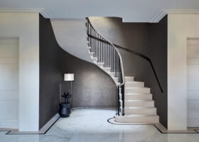 Curved cantilevered staircase by Chesney's Architectural