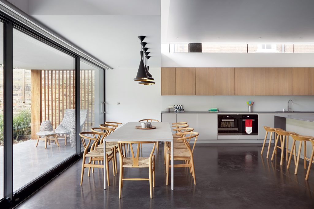 Open plan kitchen by Coupedeville Architects
