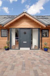 Timber clad bungalow front door