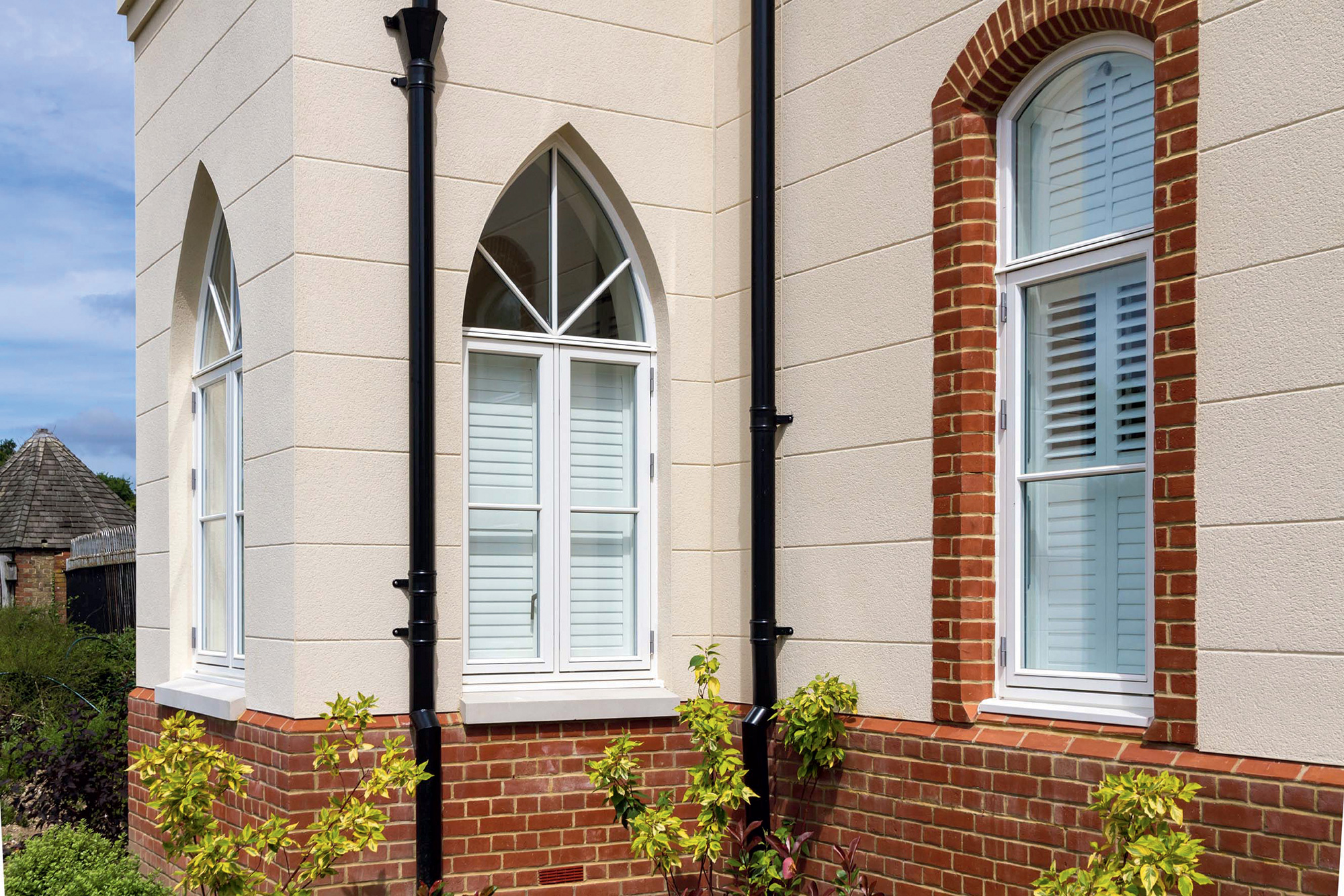 Gothic facade with Saint Gobain Weber render