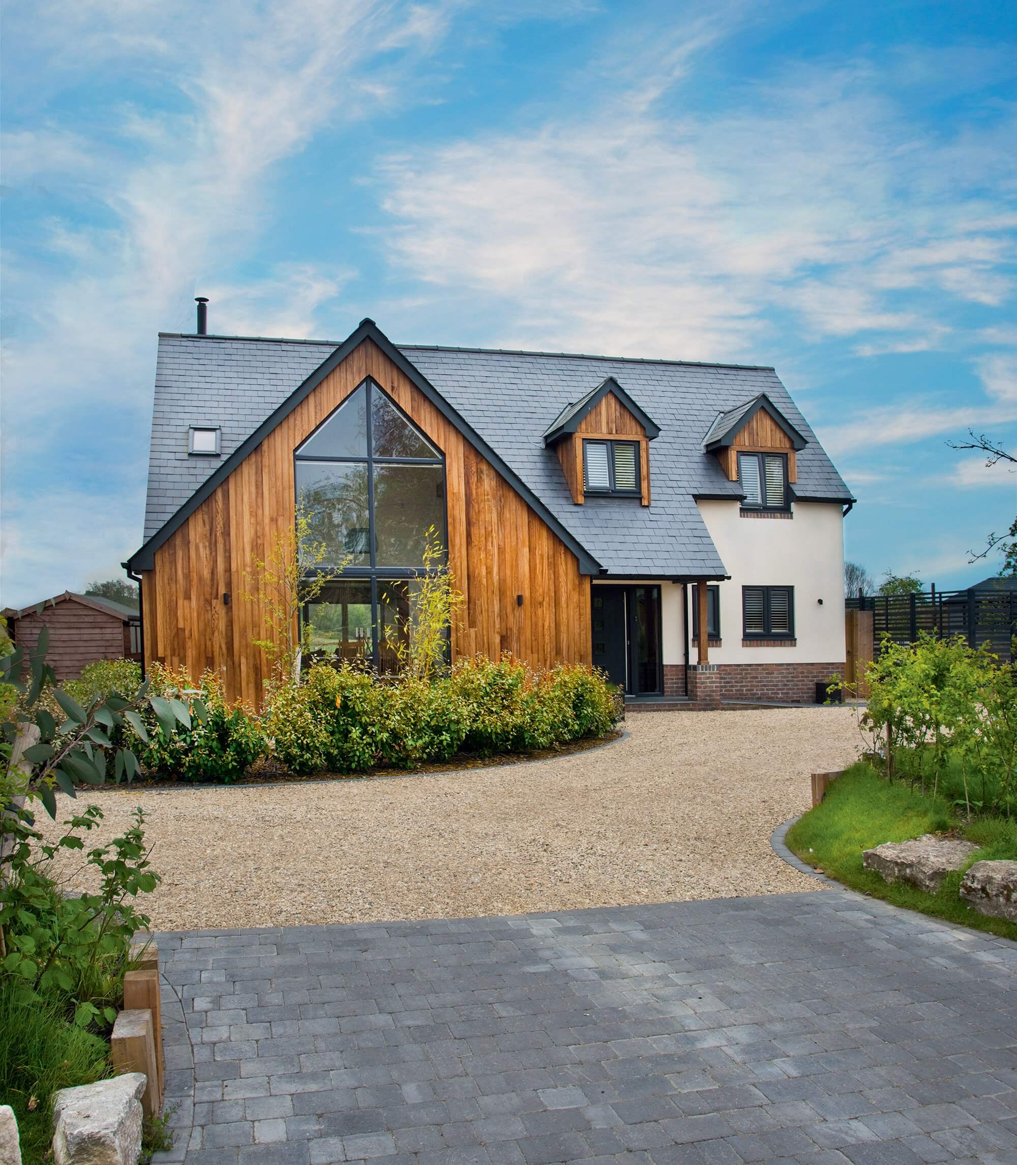 Modern timber frame home with iroko cladding