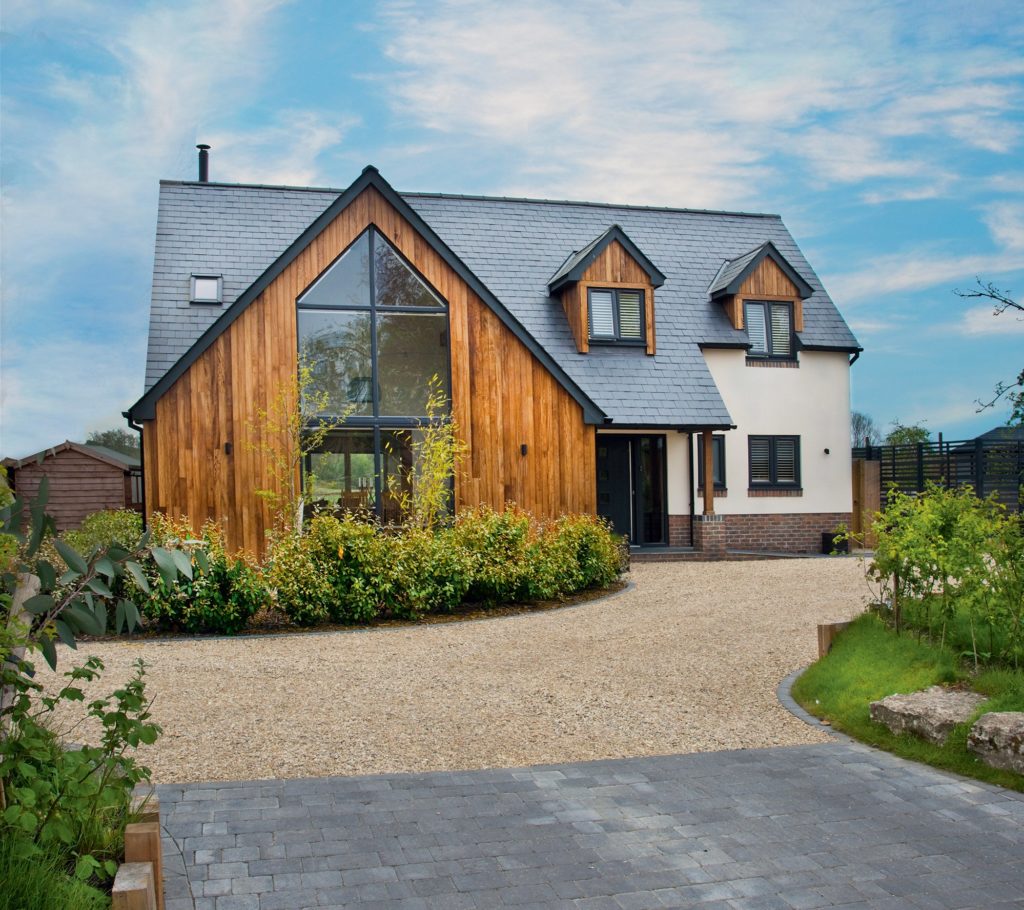 Modern timber frame home with iroko cladding