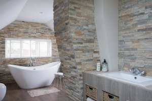 Stone tiled bathroom