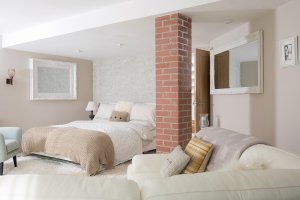 Contemporary bedroom scheme with neutral soft furnishings