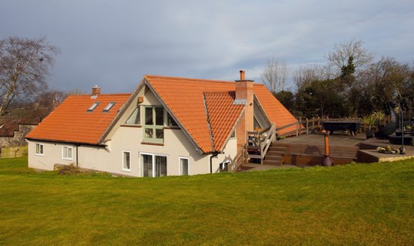 Brick and block bungalow with render finish