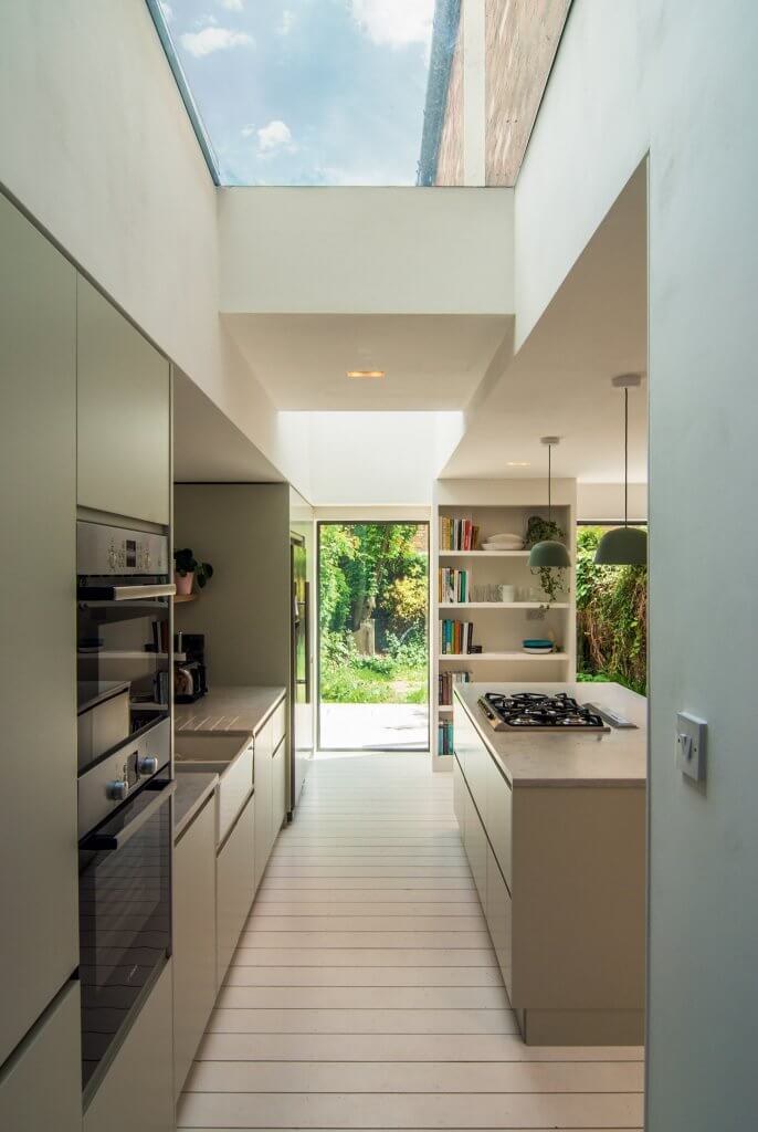 Modern kitchen scheme with rooflight by Bradely Van Der Straeten architects