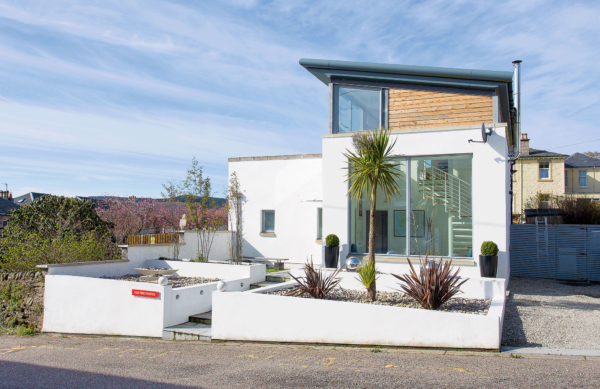 Converted fire station with wood cladding