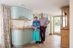 Traditional kitchen with curved units