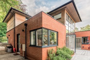 Timber frame modern home with wood cladding