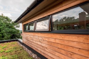 Timber frame modern home with wood cladding