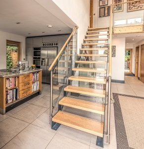 Open-tread staircase with glass balustrades
