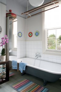 Tiled bathroom with colourful details