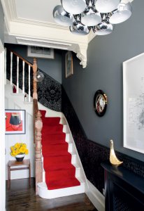 Traditional staircase with carpet runner