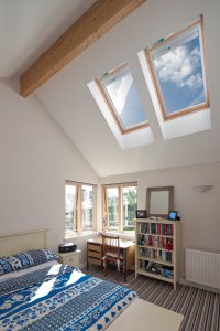 Timber frame self-build home on a sloping plot