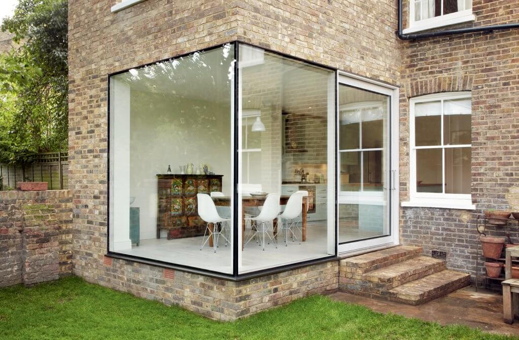 Glazed corner extension by Cousins & Cousins