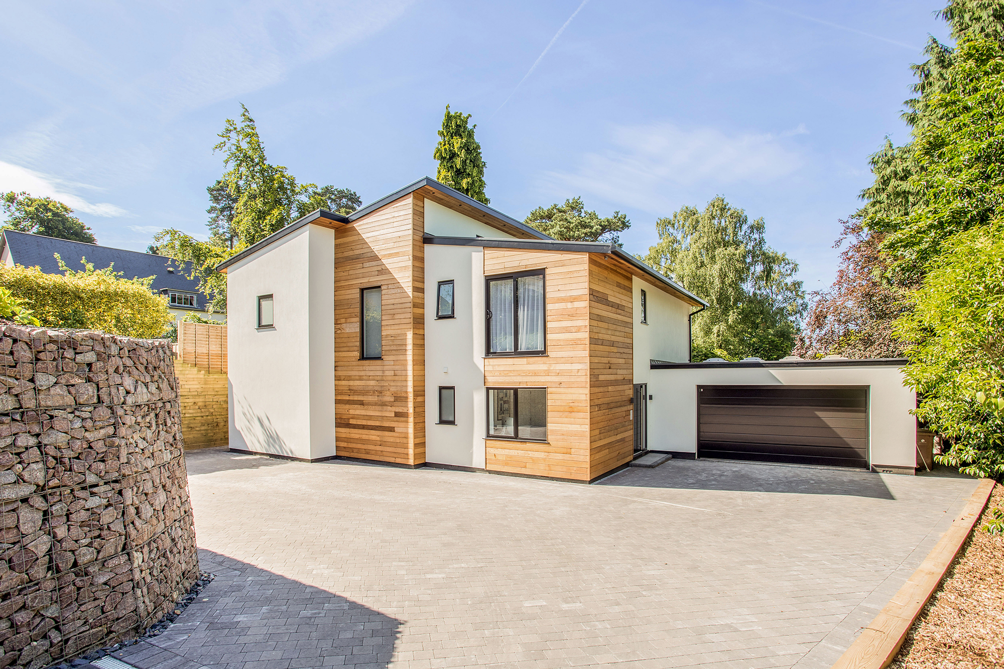 D&M modern build with wood cladding