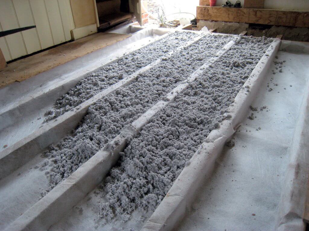 Loose cellulose floor insulation