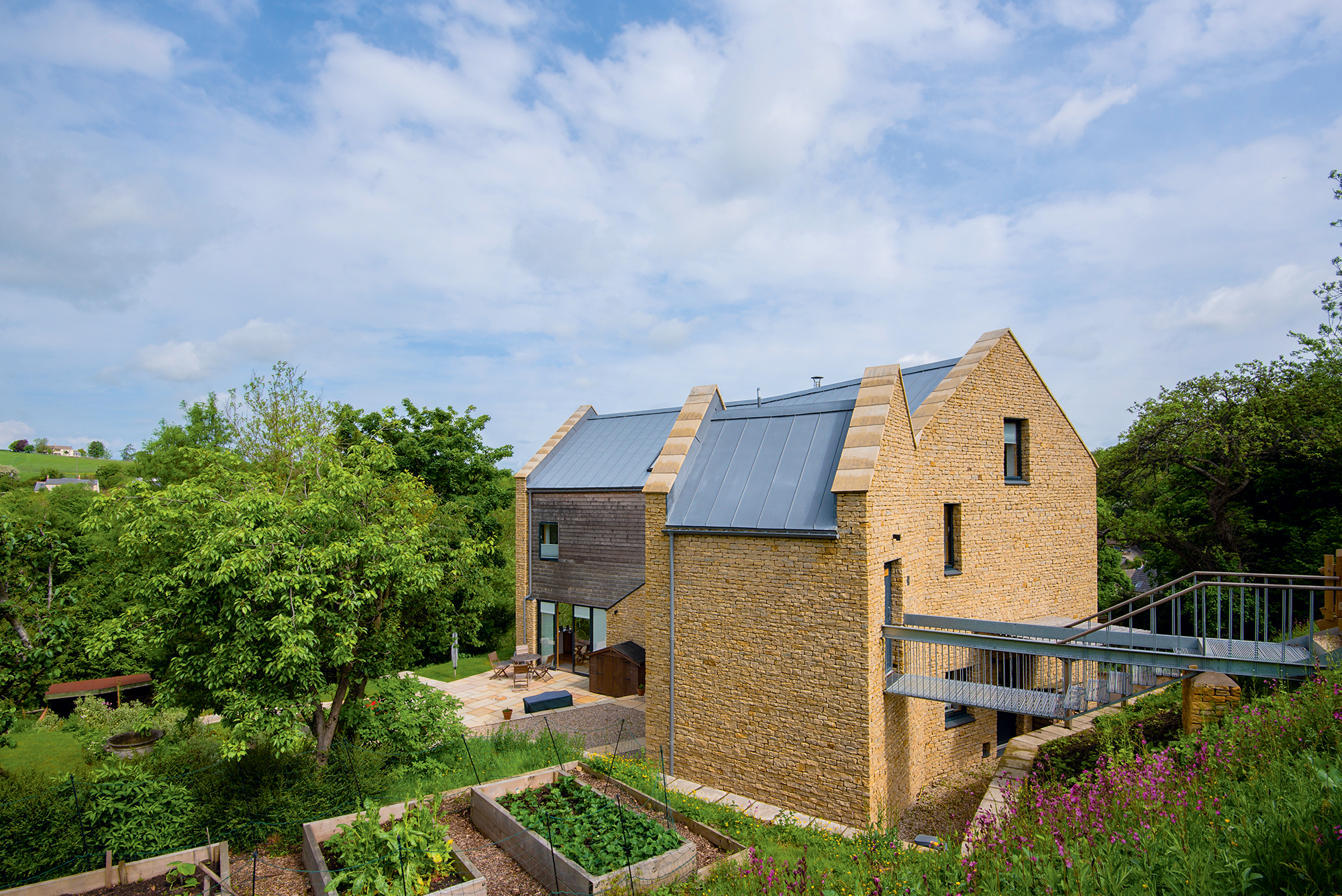 Timber frame self-build on a sloping plot