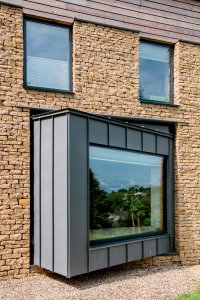 Timber frame self-build on a sloping plot