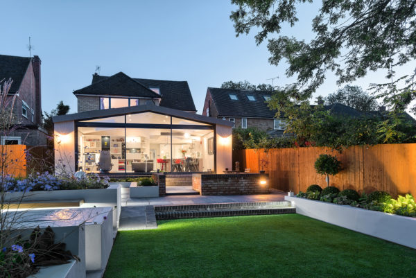 Contemporary 70s extension with sliding glazing