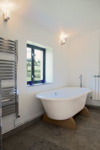 Open-plan barn conversion with zinc roof