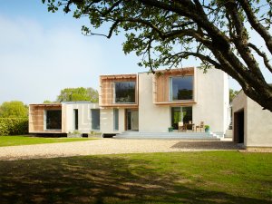 self build featuring timber cladding and render designed and built by Facit Homes