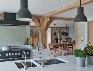 Kitchen with feature oak beams by Border Oak