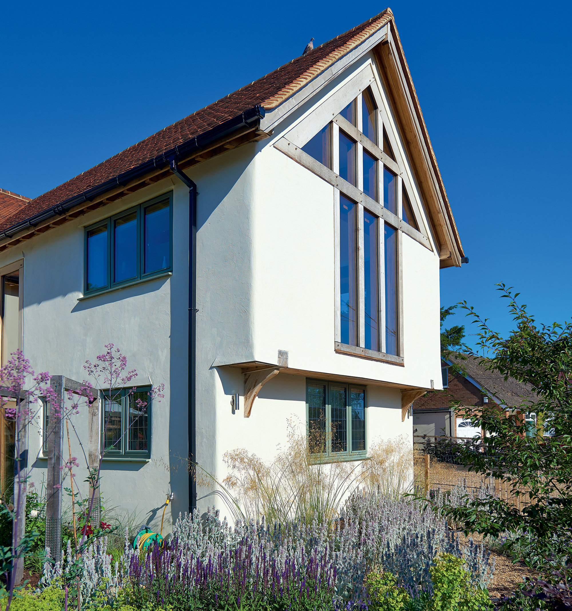 Green oak self-build with gables