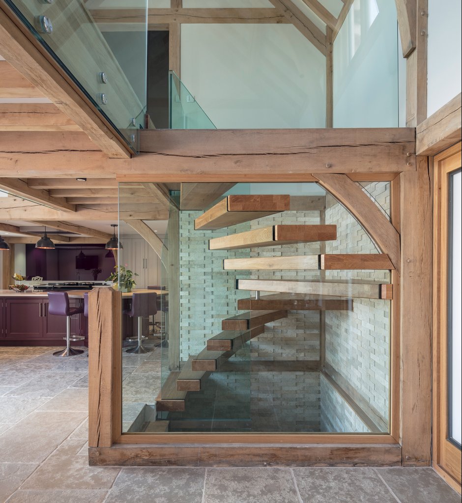 Glass and oak staircase by Welsh Oak Frame