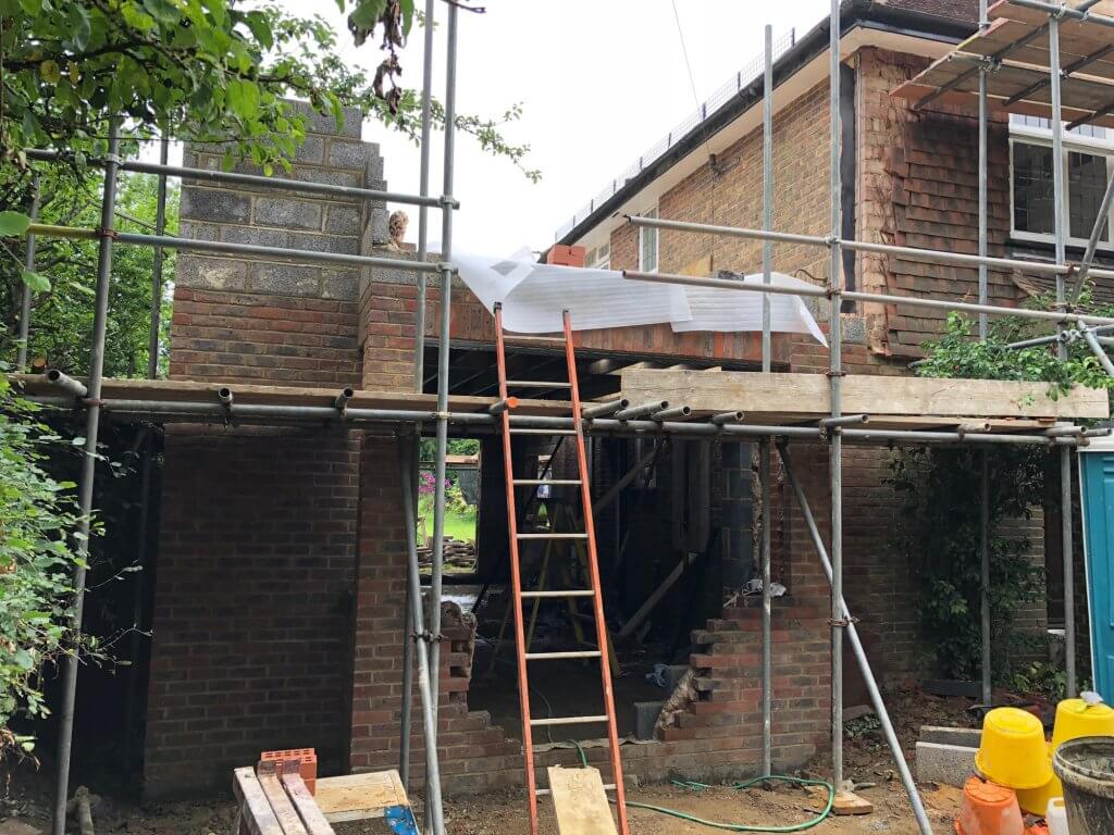 Extension to 1920s house being built before windows are fitted