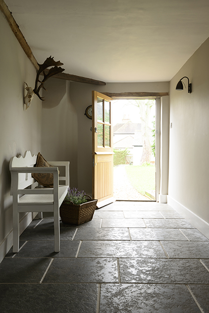 Tumbled antiqued ash limestone flooring