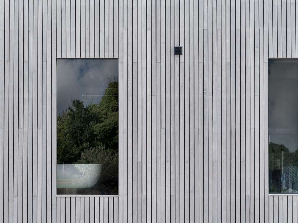 Grey siberian larch cladding up close