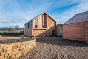 Stone-clad shawm house
