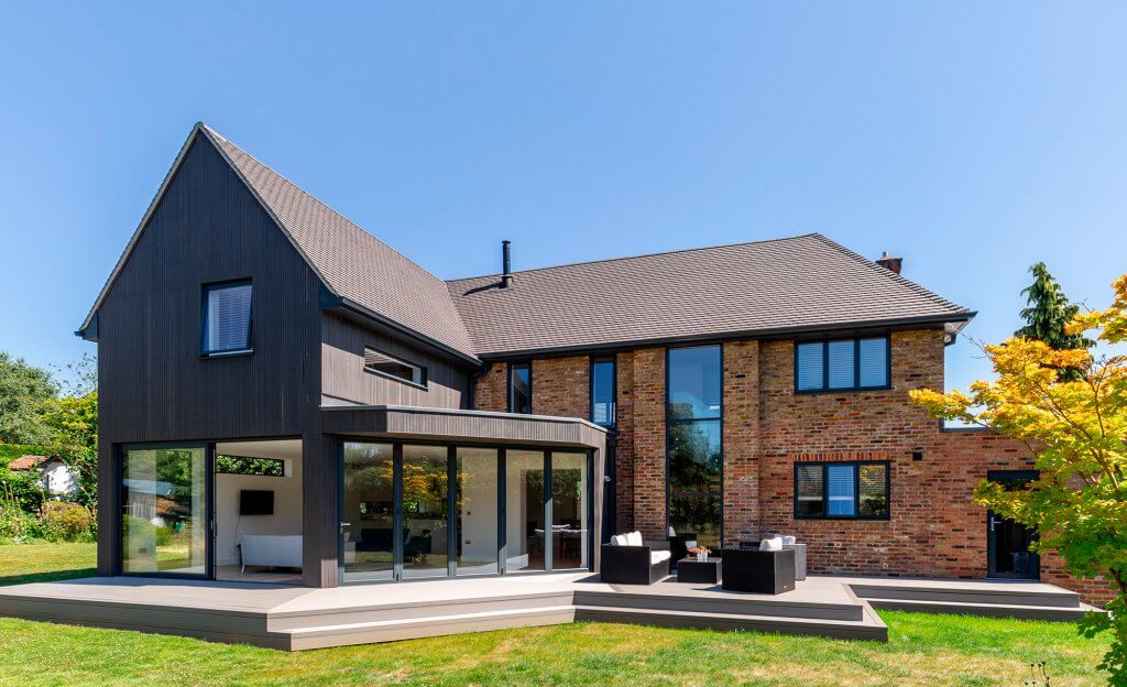 Timber clad two storey extension