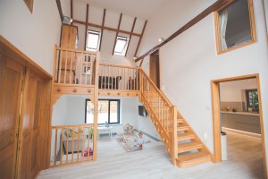 Barn conversion interior with mezzanine