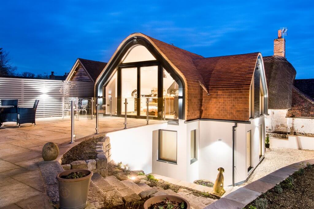 Two-storey extension to listed cottage