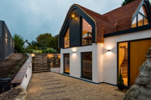 Two-storey extension to listed cottage
