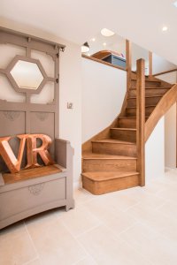 Timber staircase in two storey extension to listed cottage