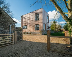 Contemporary self build clad in timber