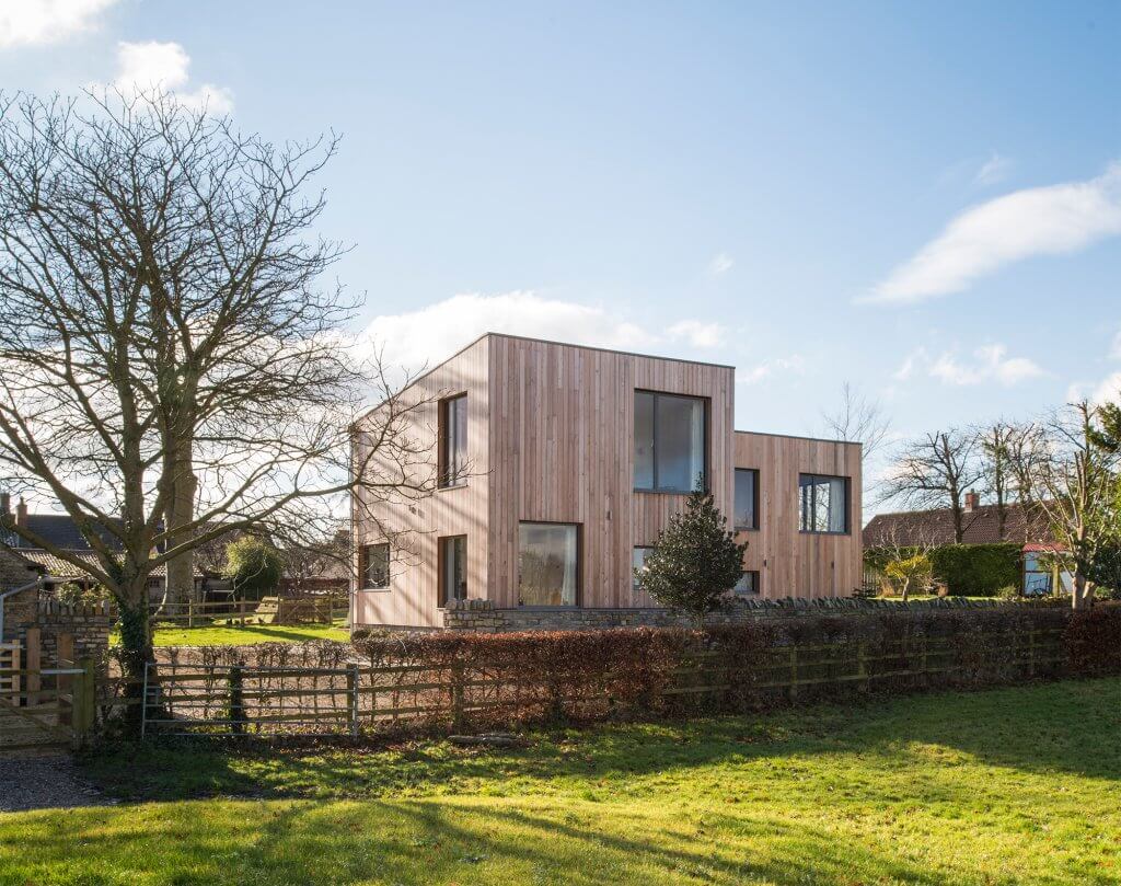 Contemporary self build clad in timber