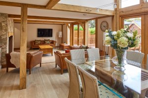 Living room in oak frame home with exposed beams