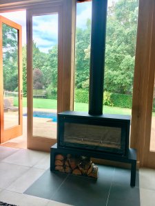 Woodburning stove in oak frame extension